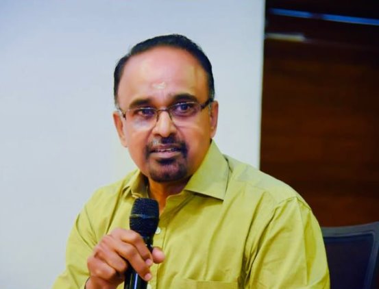 Dr. Ajayan G participating in a medical discussion